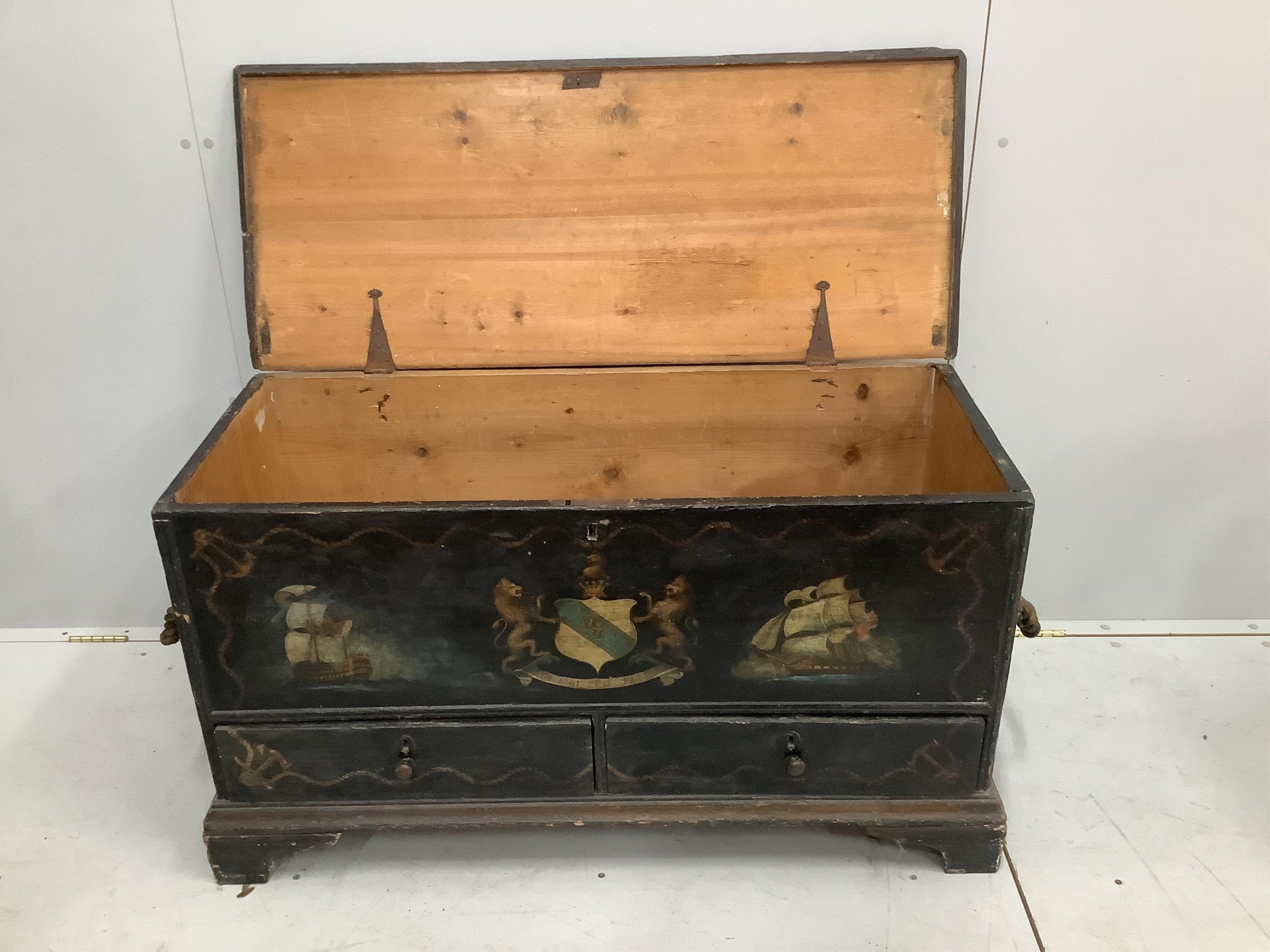 A 19th century painted pine mule chest decorated with a central armorial and English warships, width 110cm, depth 46cm, height 62cm. Condition - fair